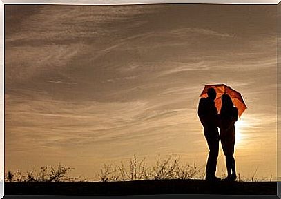 Couple under umbrella