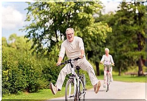 Age-friendly cities - couple rides a bike