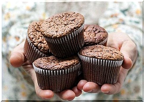 Muffins on a woman's hands