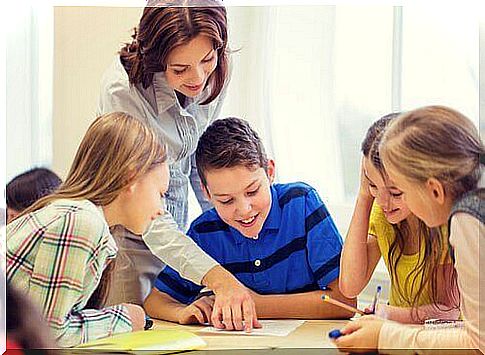 A teacher explains to her students how things are going.