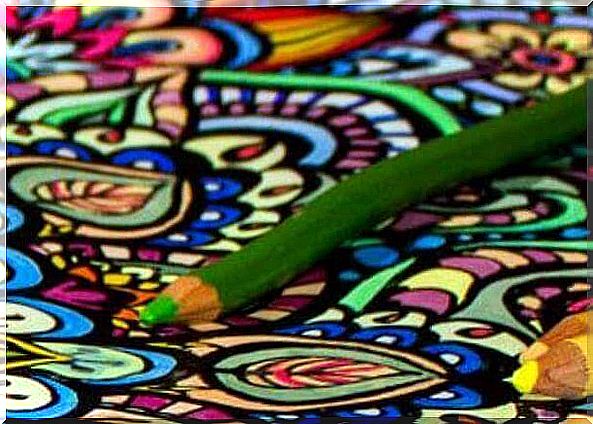 Green pencil over painted patterns