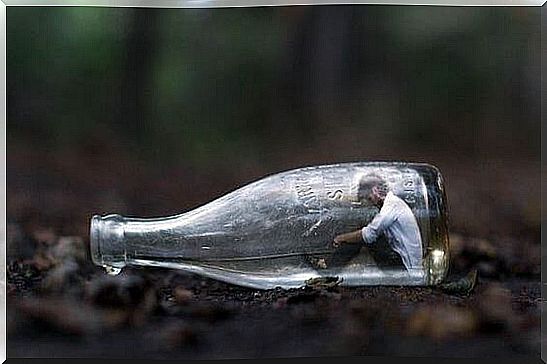 Man sitting in a bottle