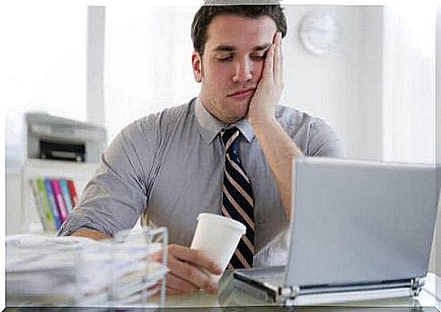 Man exhausted at work