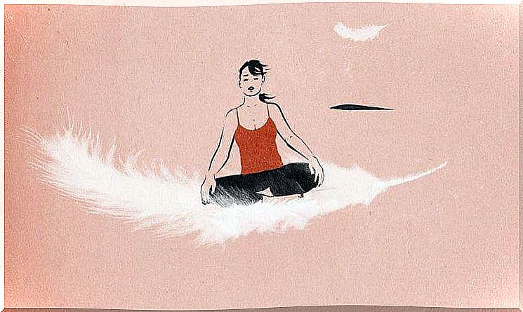 Woman practices mindfluness while sitting on a spring