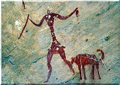 Cave painting of man and dog