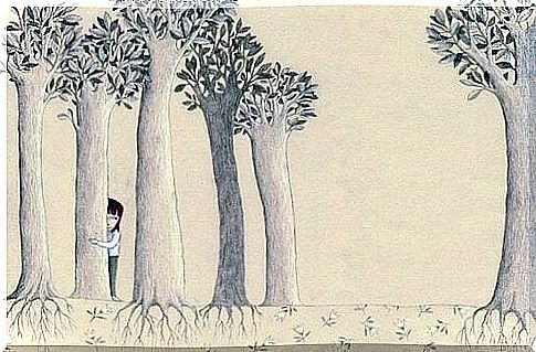 A girl is hiding behind trees. 